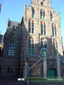 150 Detailopname van het stadhuis op de Markt in Culemborg. Het pand is in 1534 gebouwd. Dat gebeurde in opdracht van ...