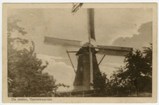 1299 Een prentbriefkaart van een molen met op de achterzijde een reclame van het fotografie-bureau Huisman uit Zwijndrecht