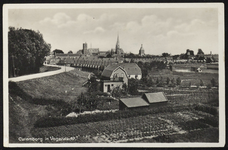 2022 Foto genomen vanaf de spoordijk met links de Kleine Buitenom en in het midden de torens van de beide Barbarakerken